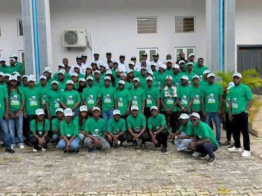 Group photo in green shirts